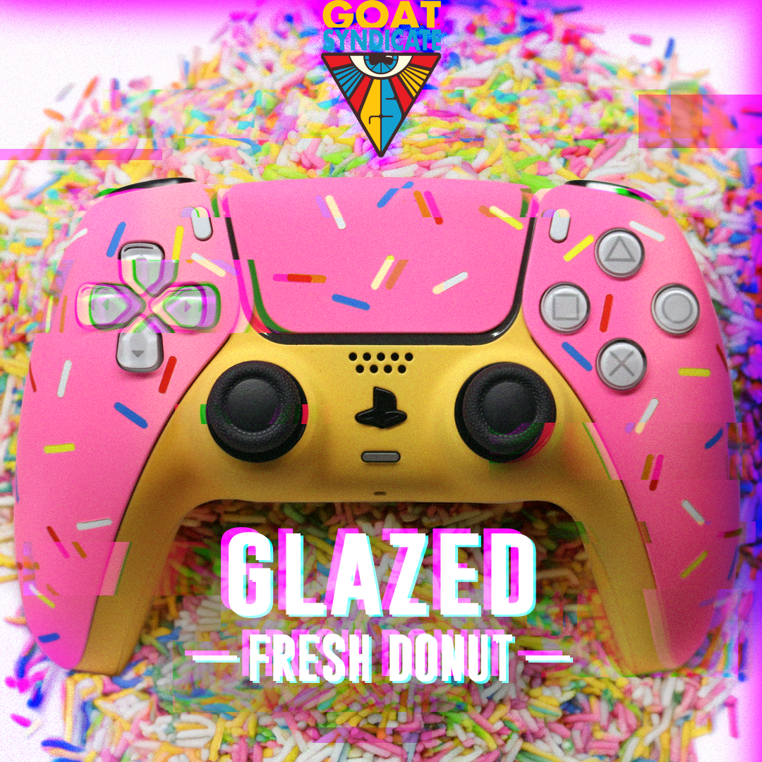 Gaming controller with pink and yellow design resembling a donut, surrounded by colorful sprinkles.