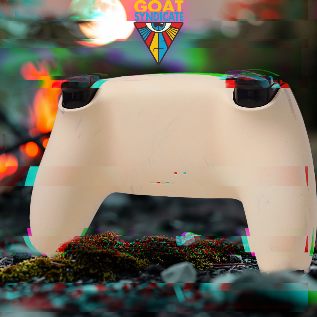 Beige helmet with black visor on a blurred colorful background, featuring 'GOAT Syndicate' logo.