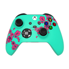 thumb- Gaming controller with floral design on a white background