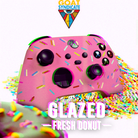 Pink gaming controller with donut and sprinkle design, featuring 'GOAT Syndicate' logo.