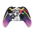thumb- Gaming controller with skull design and colorful buttons on a white background